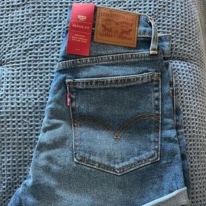 Womens Levi shorts- wedgie fit. Light wash super cute with tags size 26
